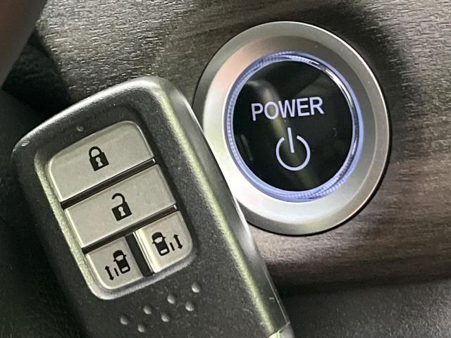 フリードハイブリッド ハイブリッド・Gホンダセンシング 両側電動ドア 純正9型ナビ バックカメラ アダプティブクルーズ スマートキー ハーフレザーシート ETC 車線逸脱警報 オートライト オートエアコン 純正15インチAW 革巻きステアリング(22枚目)