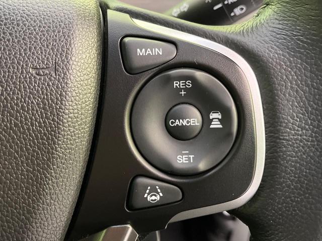 フリードハイブリッド ハイブリッド・Gホンダセンシング 両側電動ドア 純正9型ナビ バックカメラ アダプティブクルーズ スマートキー ハーフレザーシート ETC 車線逸脱警報 オートライト オートエアコン 純正15インチAW 革巻きステアリング(31枚目)