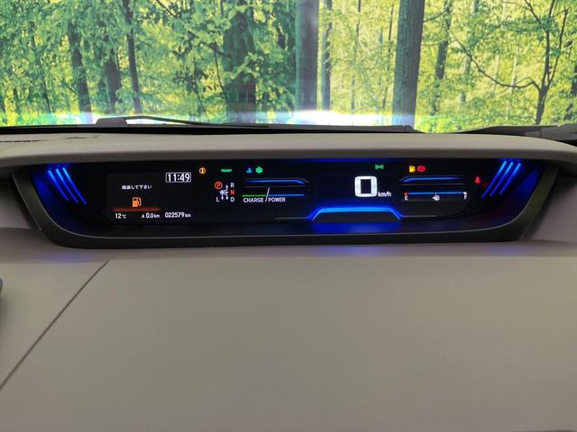 フリードハイブリッド ハイブリッド・Gホンダセンシング 両側電動ドア 純正9型ナビ バックカメラ アダプティブクルーズ スマートキー ハーフレザーシート ETC 車線逸脱警報 オートライト オートエアコン 純正15インチAW 革巻きステアリング(34枚目)