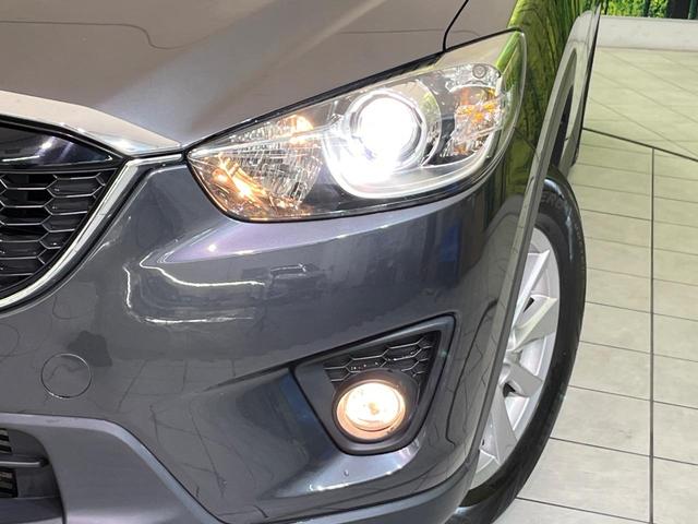CX-5 XD ナビ バックカメラ 衝突軽減装置 BOSEサウンド スマートキー HIDヘッド ETC クルコン オートライト 純正17インチAW 革巻きステアリング フォグライト ドアバイザー プライバシーガラス(12枚目)