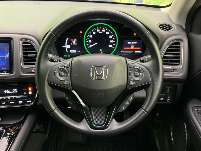ヴェゼル ハイブリッドＸ・ホンダセンシング　後期　純正８型ナビ　レーダークルーズ　バックカメラ　ＬＥＤヘッド　ＥＴＣ　誤発進抑制　車線逸脱警報　純正１７インチＡＷ　オートライト　オートエアコン　Ｂｌｕｅｔｏｏｔｈ　フルセグＴＶ　ＣＤ／ＤＶＤ再生（11枚目）