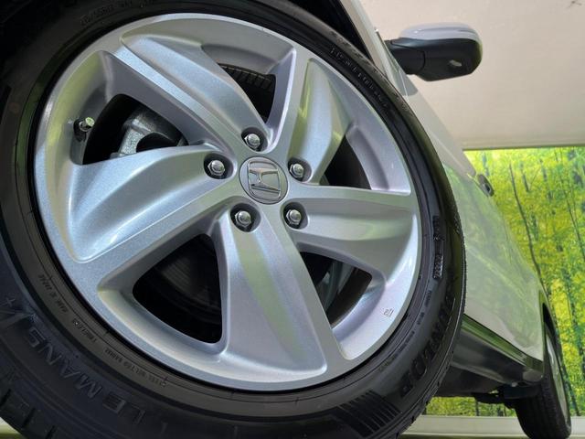 ヴェゼル ハイブリッドＸ・ホンダセンシング　後期　純正８型ナビ　レーダークルーズ　バックカメラ　ＬＥＤヘッド　ＥＴＣ　誤発進抑制　車線逸脱警報　純正１７インチＡＷ　オートライト　オートエアコン　Ｂｌｕｅｔｏｏｔｈ　フルセグＴＶ　ＣＤ／ＤＶＤ再生（13枚目）