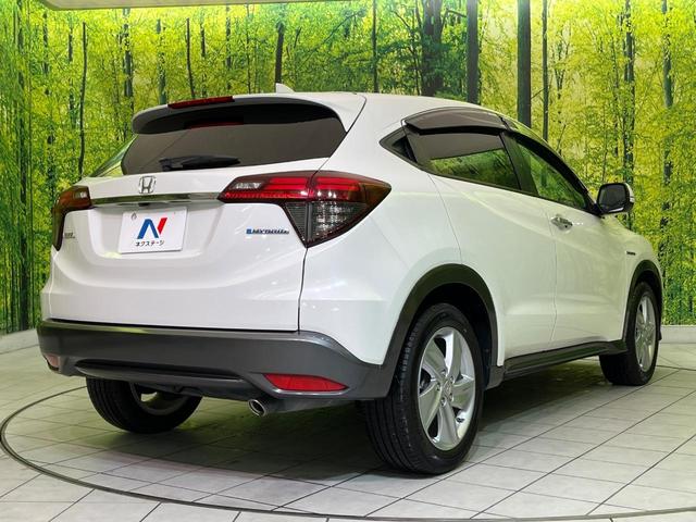 ヴェゼル ハイブリッドＸ・ホンダセンシング　後期　純正８型ナビ　レーダークルーズ　バックカメラ　ＬＥＤヘッド　ＥＴＣ　誤発進抑制　車線逸脱警報　純正１７インチＡＷ　オートライト　オートエアコン　Ｂｌｕｅｔｏｏｔｈ　フルセグＴＶ　ＣＤ／ＤＶＤ再生（17枚目）