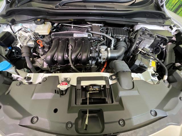ヴェゼル ハイブリッドＸ・ホンダセンシング　後期　純正８型ナビ　レーダークルーズ　バックカメラ　ＬＥＤヘッド　ＥＴＣ　誤発進抑制　車線逸脱警報　純正１７インチＡＷ　オートライト　オートエアコン　Ｂｌｕｅｔｏｏｔｈ　フルセグＴＶ　ＣＤ／ＤＶＤ再生（18枚目）