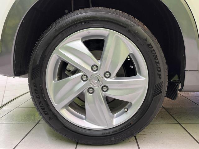 ヴェゼル ハイブリッドＸ・ホンダセンシング　後期　純正８型ナビ　レーダークルーズ　バックカメラ　ＬＥＤヘッド　ＥＴＣ　誤発進抑制　車線逸脱警報　純正１７インチＡＷ　オートライト　オートエアコン　Ｂｌｕｅｔｏｏｔｈ　フルセグＴＶ　ＣＤ／ＤＶＤ再生（29枚目）