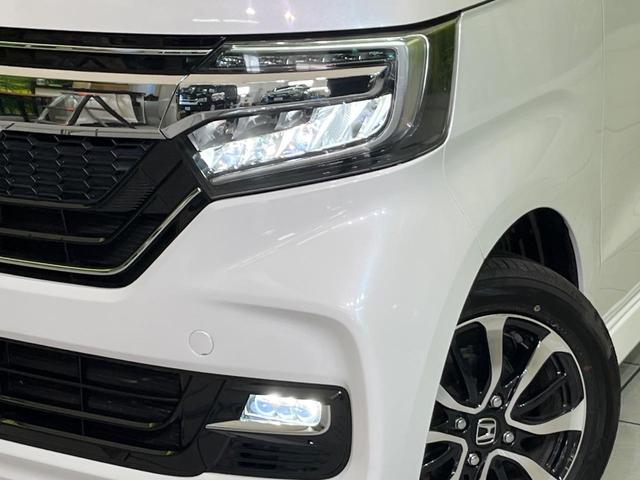 Ｎ－ＢＯＸカスタム Ｇ・Ｌホンダセンシング　電動スライド　ナビ　バックカメラ　アダプティブクルーズ　コーナーセンサー　スマートキー　ＬＥＤヘッド　ＥＴＣ　純正１４インチＡＷ　オートハイビーム　車線逸脱警報　誤発進抑制機能　先行車発進告知機（12枚目）