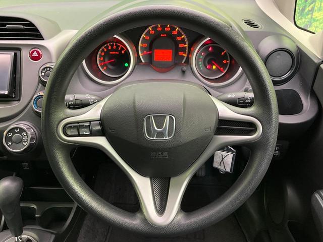 フィット Ｇ　ナビ　バックカメラ　フルセグＴＶ　ＣＤ　ＤＶＤ再生　ＥＴＣ　キーレスキー　電動ミラー　ドアバイザー　ステアリングスイッチ　１４インチＡＷ　エアコン　シガーソケット　エコモード　横滑り防止（11枚目）