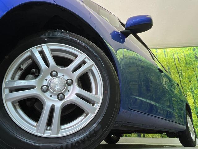 フィット Ｇ　ナビ　バックカメラ　フルセグＴＶ　ＣＤ　ＤＶＤ再生　ＥＴＣ　キーレスキー　電動ミラー　ドアバイザー　ステアリングスイッチ　１４インチＡＷ　エアコン　シガーソケット　エコモード　横滑り防止（13枚目）