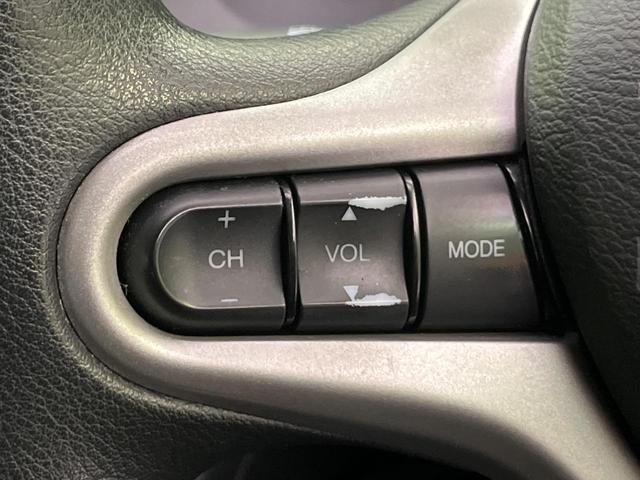 フィット Ｇ　ナビ　バックカメラ　フルセグＴＶ　ＣＤ　ＤＶＤ再生　ＥＴＣ　キーレスキー　電動ミラー　ドアバイザー　ステアリングスイッチ　１４インチＡＷ　エアコン　シガーソケット　エコモード　横滑り防止（29枚目）