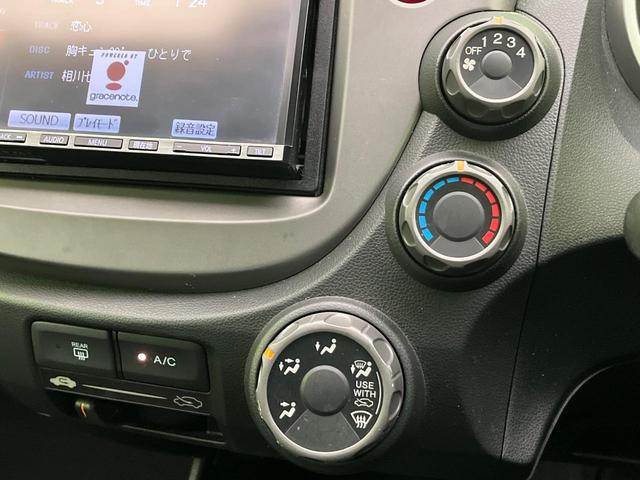 フィット Ｇ　ナビ　バックカメラ　フルセグＴＶ　ＣＤ　ＤＶＤ再生　ＥＴＣ　キーレスキー　電動ミラー　ドアバイザー　ステアリングスイッチ　１４インチＡＷ　エアコン　シガーソケット　エコモード　横滑り防止（34枚目）