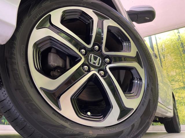 ヴェゼル ハイブリッドＺ・ホンダセンシング　後期　純正８型ナビ　バックカメラ　衝突軽減　レーダークルーズ　半革シート　シートヒーター　コーナーセンサー　純正１７インチＡＷ　スマートキー　ＬＥＤヘッド　オートライト　ＥＴＣ　ルーフレール（13枚目）