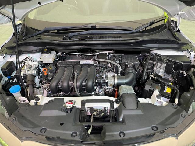 ヴェゼル ハイブリッドＺ・ホンダセンシング　後期　純正８型ナビ　バックカメラ　衝突軽減　レーダークルーズ　半革シート　シートヒーター　コーナーセンサー　純正１７インチＡＷ　スマートキー　ＬＥＤヘッド　オートライト　ＥＴＣ　ルーフレール（18枚目）