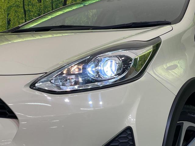 アクア クロスオーバー 純正ナビ 衝突軽減装置 ハーフレザーシート ルーフレール LEDヘッド オートハイビーム 車線逸脱警報 オートエアコン 純正16インチAW 革巻きステアリング 盗難防止装置 Bluetooth再生(12枚目)