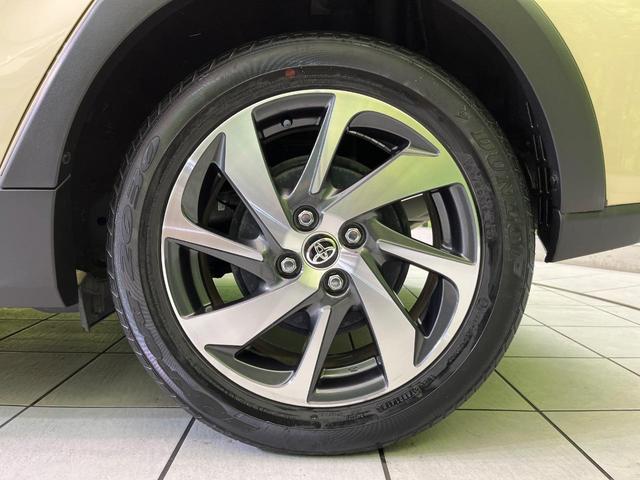 アクア クロスオーバー 純正ナビ 衝突軽減装置 ハーフレザーシート ルーフレール LEDヘッド オートハイビーム 車線逸脱警報 オートエアコン 純正16インチAW 革巻きステアリング 盗難防止装置 Bluetooth再生(65枚目)