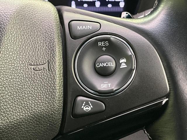 ヴェゼル ハイブリッドZ・ホンダセンシング 純正ナビ バックカメラ レーダークルーズ ハーフレザーシート スマートキー ETC シートヒーター LEDヘッド 純正17インチAW 車線逸脱警報 オートライト デュアルオートエアコン パドルシフト(6枚目)