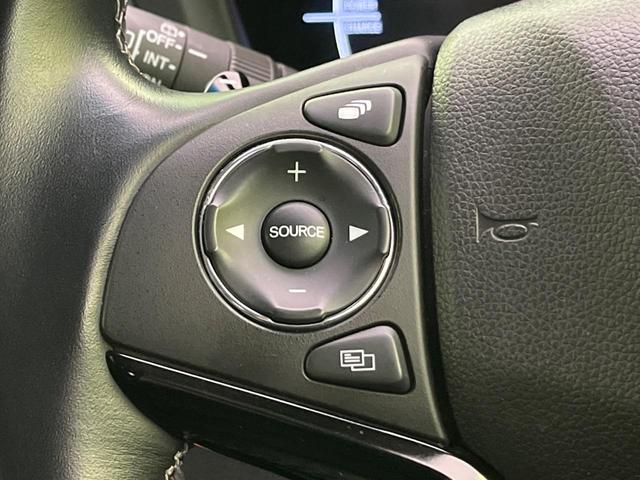 ヴェゼル ハイブリッドZ・ホンダセンシング 純正ナビ バックカメラ レーダークルーズ ハーフレザーシート スマートキー ETC シートヒーター LEDヘッド 純正17インチAW 車線逸脱警報 オートライト デュアルオートエアコン パドルシフト(59枚目)