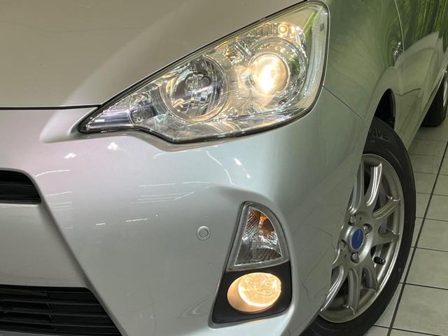 アクア Ｇ　純正ナビ　寒冷地仕様　バックカメラ　スマートキー　ＥＴＣ　オートライト　オートエアコン　Ｂｌｕｅｔｏｏｔｈ　ＣＤ／ＤＶＤ再生　フルセグ　革巻きハンドル　１５インチＡＷ　ドアバイザー　プライバシーガラス（12枚目）