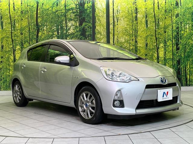 アクア Ｇ　純正ナビ　寒冷地仕様　バックカメラ　スマートキー　ＥＴＣ　オートライト　オートエアコン　Ｂｌｕｅｔｏｏｔｈ　ＣＤ／ＤＶＤ再生　フルセグ　革巻きハンドル　１５インチＡＷ　ドアバイザー　プライバシーガラス（16枚目）