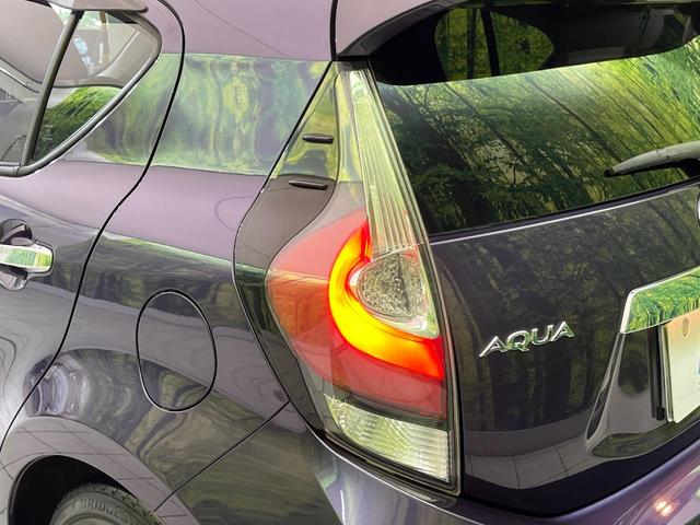 アクア Sスタイルブラック 後期 純正ナビ バックカメラ 衝突軽減 コーナーセンサー オートハイビーム 車線逸脱警報 先行車発進告知機能 オートエアコン スマートキー 横滑り防止装置 Bluetooth CD再生 ドアバイザー(29枚目)