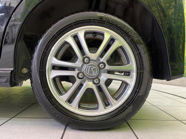 N-BOXカスタム G・Lパッケージ 両側電動ドア ナビ バックカメラ 衝突軽減装置 スマートキー HIDヘッド ETC 純正14インチAW オートライト オートエアコン Bluetooth再生 シートバックテーブル 横滑り防止装置(26枚目)