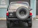 ハイラックスサーフ ＳＳＲ－Ｖリミテッド　ワイド　４ＷＤ　背面タイヤ　２インチリフトアップ　ラプター施工　新品ヨコハマジオランダーＧ００３　ＭＴタイヤ　新品デイトナホイール　　黒レザー調シートカバー　ドアバイザー　下廻りエンドックス施工（6枚目）