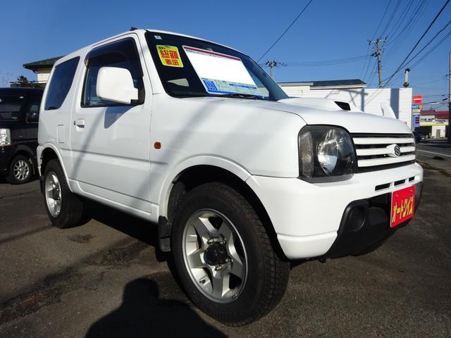 ジムニー ＸＧ　４ＷＤ　オートマ　ナビＴＶ　キーレスエントリー　アルミホイール　背面タイヤ　エアコン　パワステ　パワーウィンドウ　運転席助手席エアバック（3枚目）