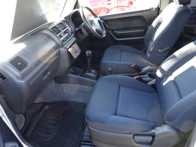 ジムニー ＸＧ　４ＷＤ　オートマ　ナビＴＶ　キーレスエントリー　アルミホイール　背面タイヤ　エアコン　パワステ　パワーウィンドウ　運転席助手席エアバック（9枚目）