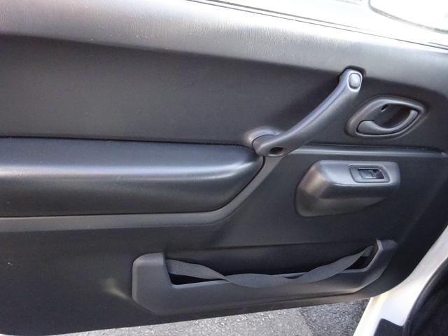 ジムニー ＸＧ　４ＷＤ　オートマ　ナビＴＶ　キーレスエントリー　アルミホイール　背面タイヤ　エアコン　パワステ　パワーウィンドウ　運転席助手席エアバック（12枚目）