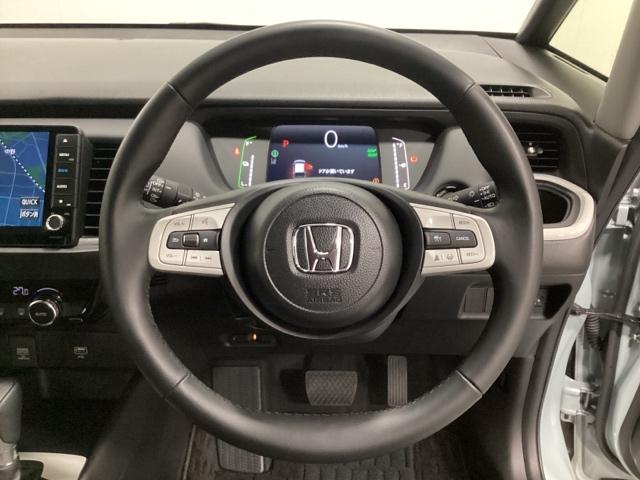 フィット e:HEVホーム 中古スタッドレスタイヤ、純正メモリーナビ、ドライブレコーダー前後装着+ETC付 当社デモカー 前後誤発進抑制機能 クリソナ 助手席エアバッグ 運転席エアバッグ 1オナ アイドリングストップ USB接続(14枚目)