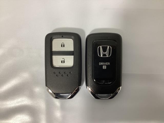 フィット e:HEVホーム 中古スタッドレスタイヤ、純正メモリーナビ、ドライブレコーダー前後装着+ETC付 当社デモカー 前後誤発進抑制機能 クリソナ 助手席エアバッグ 運転席エアバッグ 1オナ アイドリングストップ USB接続(15枚目)