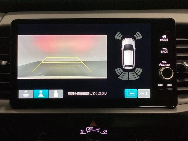 フィット ｅ：ＨＥＶホーム　中古スタッドレスタイヤ、純正メモリーナビ、ドライブレコーダー前後装着＋ＥＴＣ付　当社デモカー　リヤカメラ　ＶＳＡ　サイドカーテンエアバック　前後ソナー　スマートキ　ＥＣＯＮモード　踏み間違い防止（10枚目）