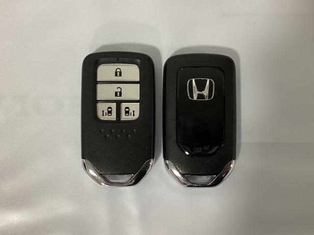 ステップワゴンスパーダ スパーダ・クールスピリットホンダセンシング 光触媒抗菌消臭施工済 サイドエアバック スマートキ 左右電動スライドドア バックモニタ Wエアコン 地TV ナビ&TV 三列シート 助手席エアバッグ AAC 横滑り防止機能 ターボ車 シートヒータ(14枚目)