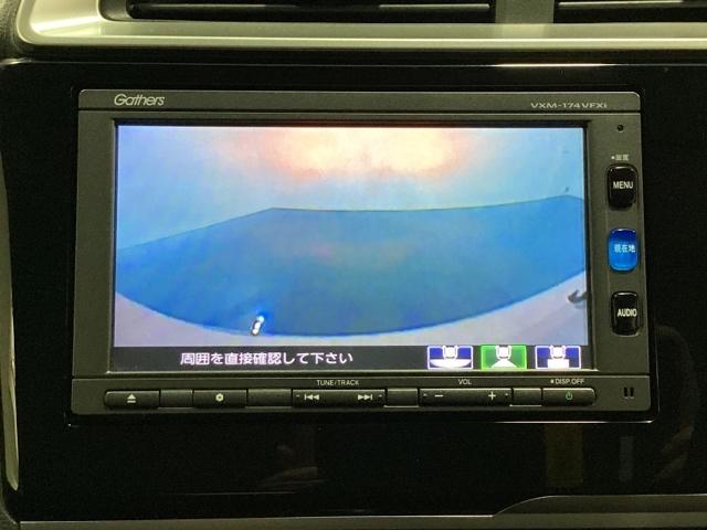 フィット １３Ｇ・Ｆパッケージ　光触媒抗菌消臭施工済　イモビ　ＤＶＤ再生可能　スマ－トキ－　ＶＳＡ　地デジＴＶ　助手席エアバッグ　Ｒカメラ　オートエアコン　エアバック　ＰＳ　キ－フリ－　ＰＷ　ＡＢＳ　ＴＶナビ　アイドリングＳＴＯＰ（7枚目）