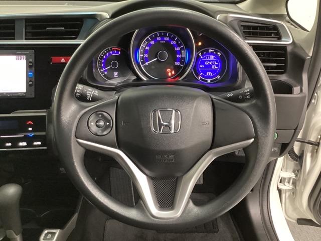 フィット １３Ｇ・Ｆパッケージ　光触媒抗菌消臭施工済　イモビ　ＤＶＤ再生可能　スマ－トキ－　ＶＳＡ　地デジＴＶ　助手席エアバッグ　Ｒカメラ　オートエアコン　エアバック　ＰＳ　キ－フリ－　ＰＷ　ＡＢＳ　ＴＶナビ　アイドリングＳＴＯＰ（11枚目）