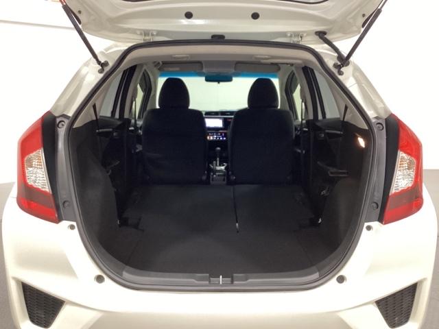 フィット １３Ｇ・Ｆパッケージ　光触媒抗菌消臭施工済　イモビ　ＤＶＤ再生可能　スマ－トキ－　ＶＳＡ　地デジＴＶ　助手席エアバッグ　Ｒカメラ　オートエアコン　エアバック　ＰＳ　キ－フリ－　ＰＷ　ＡＢＳ　ＴＶナビ　アイドリングＳＴＯＰ（18枚目）