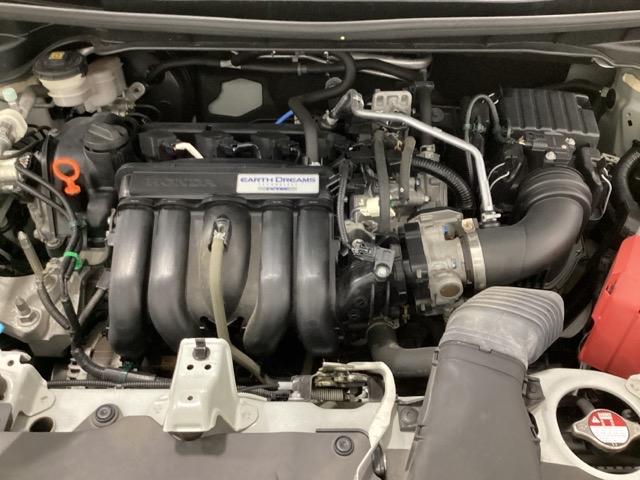 フィット １３Ｇ・Ｆパッケージ　光触媒抗菌消臭施工済　イモビ　ＤＶＤ再生可能　スマ－トキ－　ＶＳＡ　地デジＴＶ　助手席エアバッグ　Ｒカメラ　オートエアコン　エアバック　ＰＳ　キ－フリ－　ＰＷ　ＡＢＳ　ＴＶナビ　アイドリングＳＴＯＰ（19枚目）