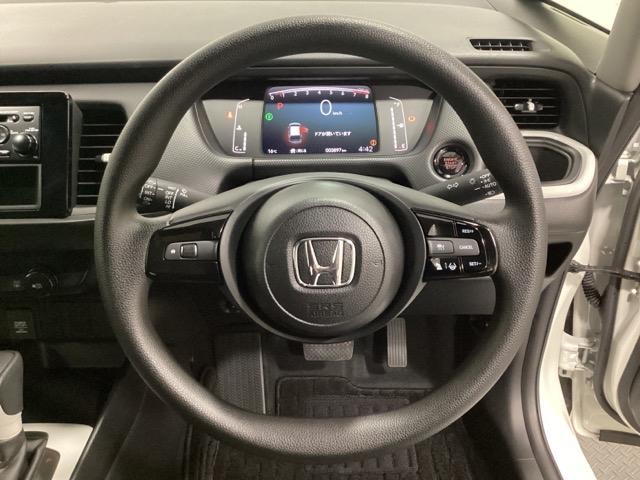 フィット ベーシック 中古スタッドレスタイヤ、純正CDチューナー、ドライブレコーダー前後装着+ETC付 当社デモカー コーナーセンサー 横滑防止装置 オートエアコン パワーウインドウ 盗難防止システム ABS ワンオーナー(12枚目)