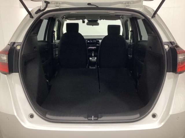 フィット ベーシック 中古スタッドレスタイヤ、純正CDチューナー、ドライブレコーダー前後装着+ETC付 当社デモカー コーナーセンサー 横滑防止装置 オートエアコン パワーウインドウ 盗難防止システム ABS ワンオーナー(22枚目)