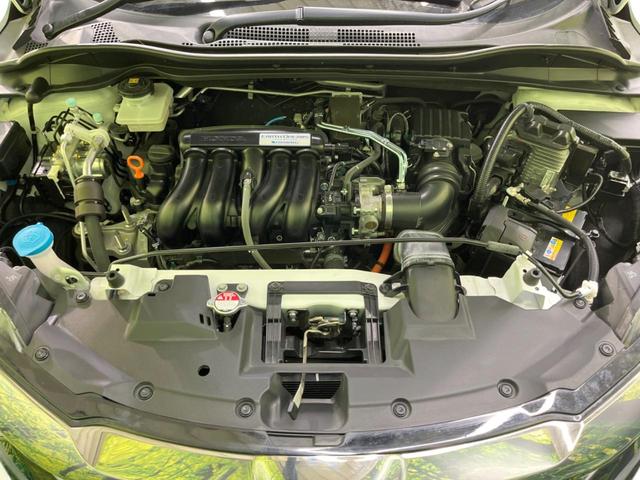 ハイブリッドZ・ホンダセンシング 禁煙車 純正ナビ レーダークルーズ 寒冷地仕様 バックカメラ Bluetooth再生 フルセグ ETC シートヒーター LEDヘッドライト レーンキープ 踏み間違い防止 車線逸脱警報 DVD(20枚目)