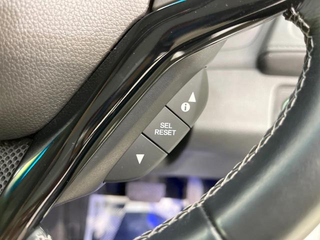 ハイブリッドZ・ホンダセンシング 禁煙車 純正ナビ レーダークルーズ 寒冷地仕様 バックカメラ Bluetooth再生 フルセグ ETC シートヒーター LEDヘッドライト レーンキープ 踏み間違い防止 車線逸脱警報 DVD(29枚目)