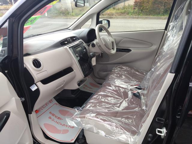 eKワゴン M 4WD シートヒーター キーレス 社外14インチAW 電動格納ドアミラー オートエアコン(11枚目)