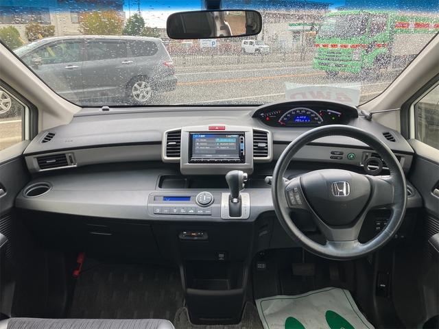 フリード G エアロ 4WD ETC バックカメラ ナビ TV 両側電動スライドドア オートライト HID スマートキー 電動格納ミラー 3列シート ウォークスルー AT アルミホイール CD DVD再生 USB(2枚目)