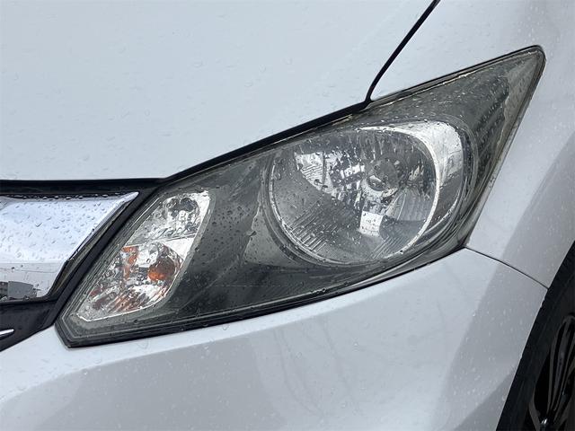 フリード G エアロ 4WD ETC バックカメラ ナビ TV 両側電動スライドドア オートライト HID スマートキー 電動格納ミラー 3列シート ウォークスルー AT アルミホイール CD DVD再生 USB(27枚目)