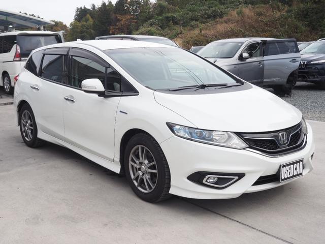 ジェイド ハイブリッドX 車検整備付き 1年保証 ナビ TV バックカメラ ETC(3枚目)