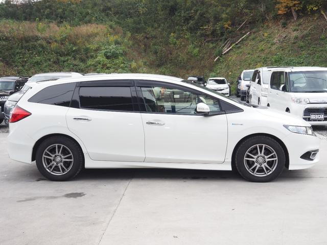 ジェイド ハイブリッドX 車検整備付き 1年保証 ナビ TV バックカメラ ETC(4枚目)