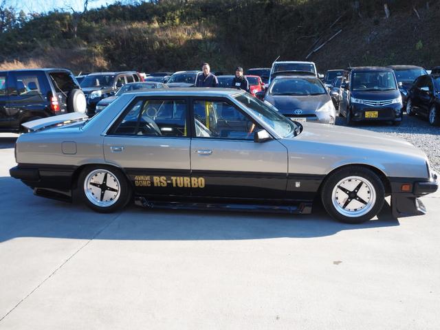 スカイライン 　車検整備付き　５ＭＴ　Ｆ・Ｓ・Ｒエアロ　社外ウッドハンドル　４点式ロールバー　ＨＯＳＨＩＮＯＲＡＣＩＮＧホイール　ローダウン　社外マフラー　Ｒウィング（ゲタ羽）（4枚目）