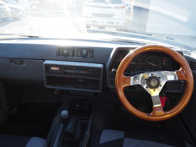 スカイライン 　車検整備付き　５ＭＴ　Ｆ・Ｓ・Ｒエアロ　社外ウッドハンドル　４点式ロールバー　ＨＯＳＨＩＮＯＲＡＣＩＮＧホイール　ローダウン　社外マフラー　Ｒウィング（ゲタ羽）（16枚目）