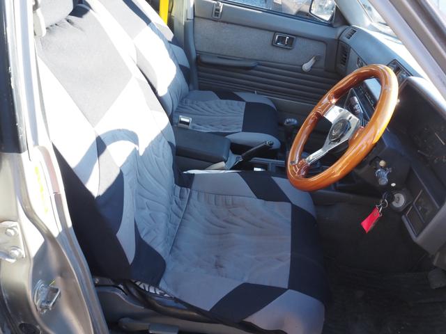 スカイライン 　車検整備付き　５ＭＴ　Ｆ・Ｓ・Ｒエアロ　社外ウッドハンドル　４点式ロールバー　ＨＯＳＨＩＮＯＲＡＣＩＮＧホイール　ローダウン　社外マフラー　Ｒウィング（ゲタ羽）（17枚目）