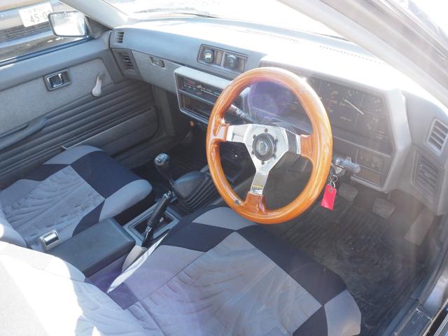 スカイライン 　車検整備付き　５ＭＴ　Ｆ・Ｓ・Ｒエアロ　社外ウッドハンドル　４点式ロールバー　ＨＯＳＨＩＮＯＲＡＣＩＮＧホイール　ローダウン　社外マフラー　Ｒウィング（ゲタ羽）（19枚目）