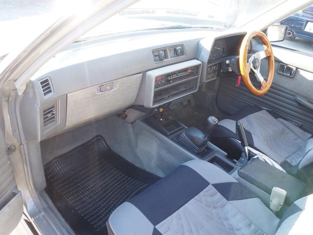 スカイライン 　車検整備付き　５ＭＴ　Ｆ・Ｓ・Ｒエアロ　社外ウッドハンドル　４点式ロールバー　ＨＯＳＨＩＮＯＲＡＣＩＮＧホイール　ローダウン　社外マフラー　Ｒウィング（ゲタ羽）（20枚目）